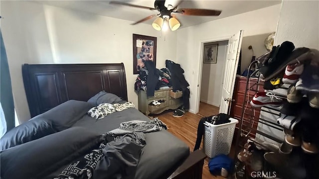 10218 Virginia Ave, South Gate, CA 90280 - bedroom featuring wood finished floors and ceiling fan