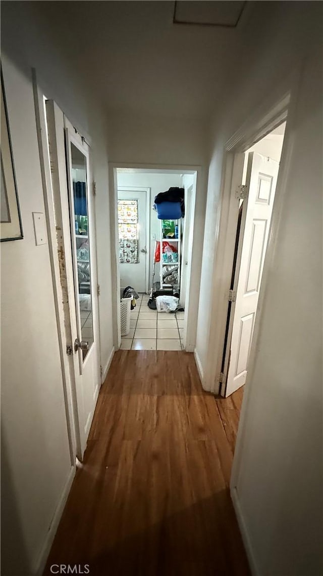10218 Virginia Ave, South Gate, CA 90280 - hallway featuring wood finished floors and baseboards