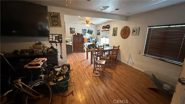 10218 Virginia Ave, South Gate, CA 90280 - dining space with a ceiling fan and light wood-style flooring