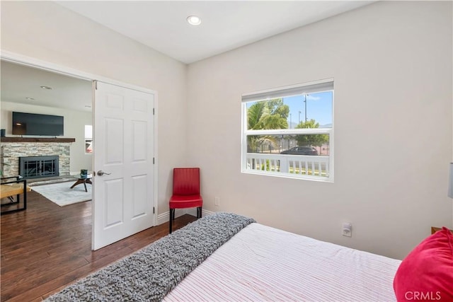 321 N Keystone St, Burbank, CA 91506 - bedroom featuring wood finished floors, a fireplace, and recessed lighting