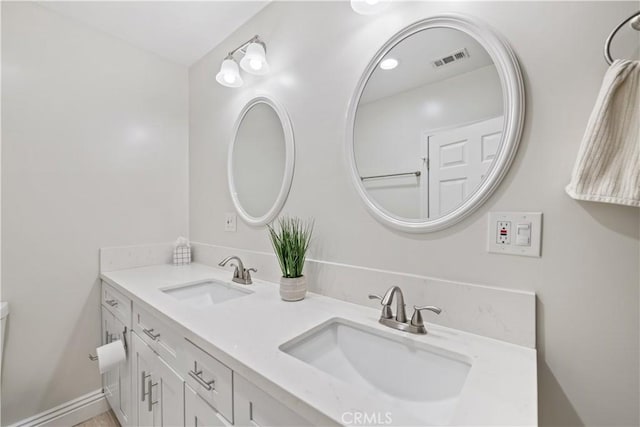 321 N Keystone St, Burbank, CA 91506 - bathroom featuring double vanity and toilet