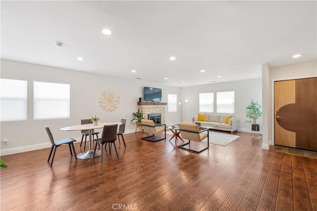 321 N Keystone St, Burbank, CA 91506 - dining area featuring a stone fireplace, wood-type flooring, and recessed lighting
