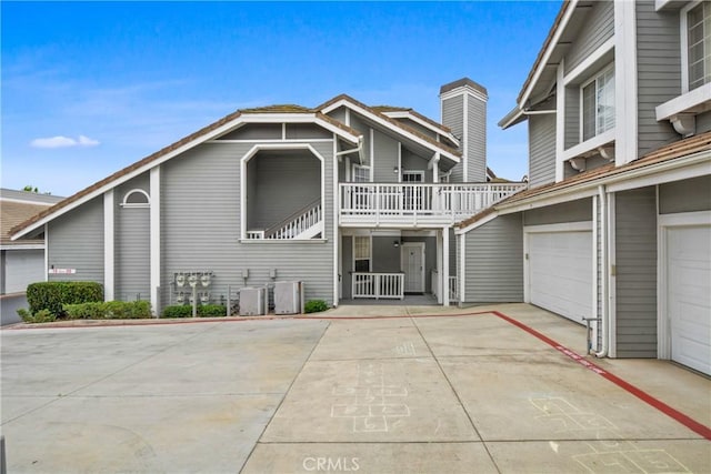 10361 Garden Grove Blvd Unit 17, Garden Grove, CA 92843 - view of property featuring a garage and driveway
