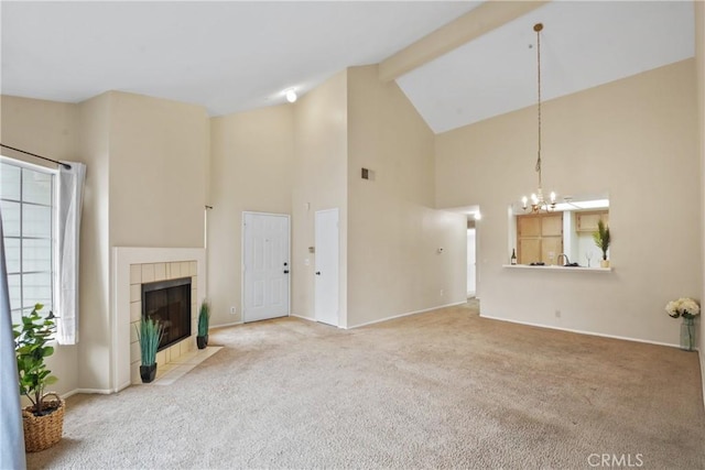 10361 Garden Grove Blvd Unit 17, Garden Grove, CA 92843 - unfurnished living room featuring high vaulted ceiling, a chandelier, carpet flooring, a fireplace, and beamed ceiling