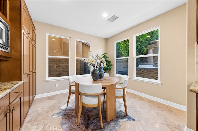 27684 Manor Hill Rd, Laguna Niguel, CA 92677 - dining space with light tile patterned flooring and recessed lighting