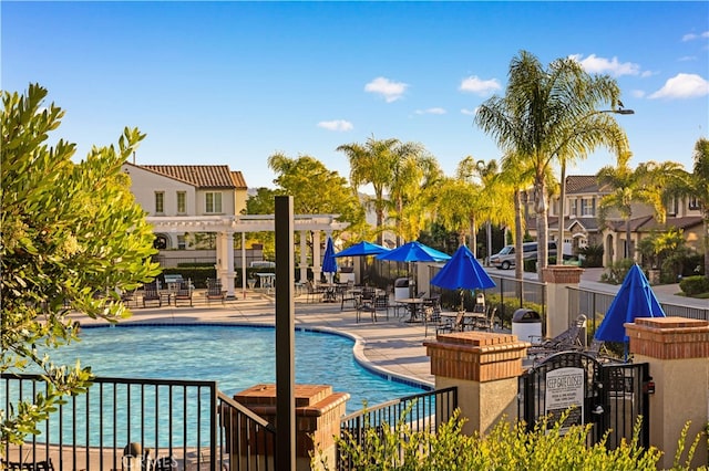 27684 Manor Hill Rd, Laguna Niguel, CA 92677 - community pool with a patio area and a pergola
