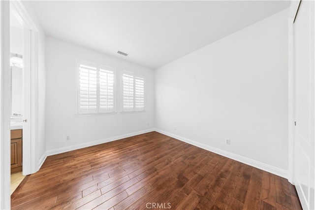 27684 Manor Hill Rd, Laguna Niguel, CA 92677 - unfurnished bedroom with hardwood / wood-style floors, a closet, and connected bathroom