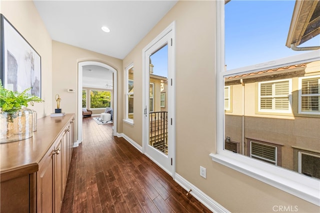 27684 Manor Hill Rd, Laguna Niguel, CA 92677 - hall with dark wood finished floors, arched walkways, and recessed lighting