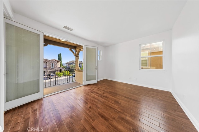 27684 Manor Hill Rd, Laguna Niguel, CA 92677 - empty room featuring dark wood-style flooring and baseboards