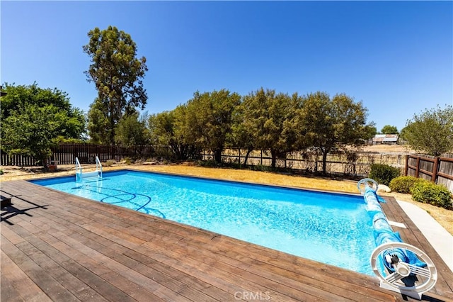 2911 Gilead Ln, Paso Robles, CA 93446 - view of swimming pool featuring a fenced backyard and a wooden deck