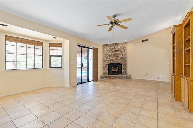 2911 Gilead Ln, Paso Robles, CA 93446 - unfurnished living room featuring ceiling fan, vaulted ceiling, light tile patterned floors, and a fireplace