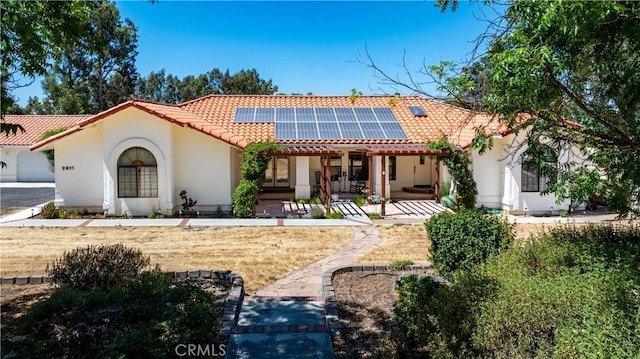 2911 Gilead Ln, Paso Robles, CA 93446 - view of front of property featuring a tile roof, roof mounted solar panels, and stucco siding