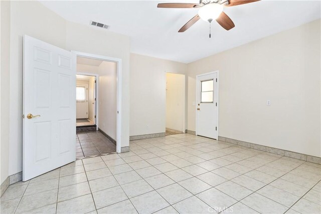 2911 Gilead Ln, Paso Robles, CA 93446 - empty room featuring ceiling fan, healthy amount of natural light, and light tile patterned floors