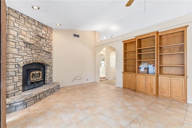 2911 Gilead Ln, Paso Robles, CA 93446 - unfurnished living room featuring arched walkways, a ceiling fan, lofted ceiling, light tile patterned floors, and recessed lighting