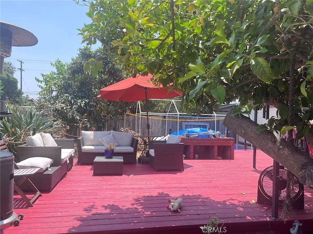 934 W 12th St, Pomona, CA 91766 - wooden terrace featuring an outdoor living space and a fenced backyard