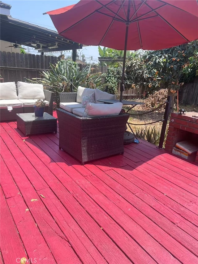 934 W 12th St, Pomona, CA 91766 - wooden deck with an outdoor hangout area
