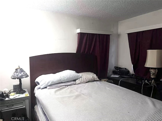 934 W 12th St, Pomona, CA 91766 - bedroom with a textured ceiling