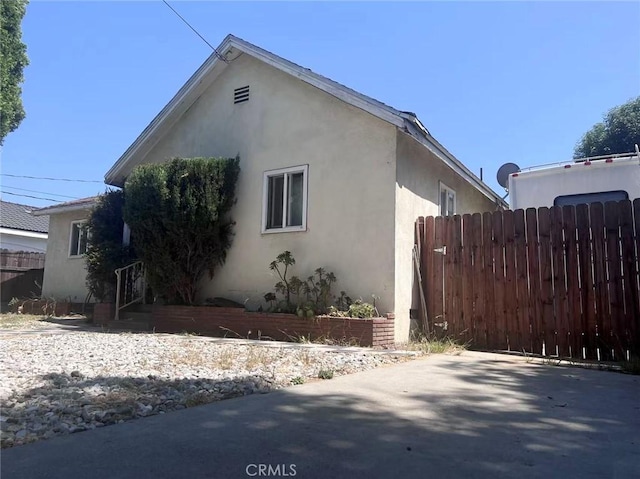 934 W 12th St, Pomona, CA 91766 - view of side of property featuring stucco siding