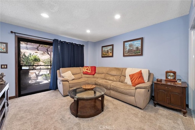 9349 Hartman Way, West Hills, CA 91304 - living area with light colored carpet, a textured ceiling, and recessed lighting