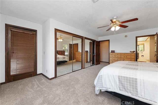9349 Hartman Way, West Hills, CA 91304 - bedroom featuring carpet floors, a textured ceiling, multiple closets, ceiling fan, and ensuite bath