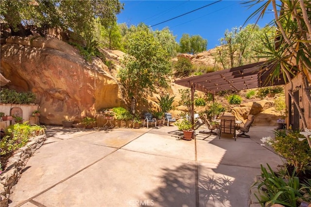 9349 Hartman Way, West Hills, CA 91304 - view of patio featuring a pergola
