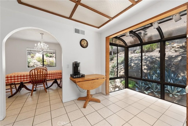 9349 Hartman Way, West Hills, CA 91304 - dining room with arched walkways, light tile patterned floors, and a chandelier