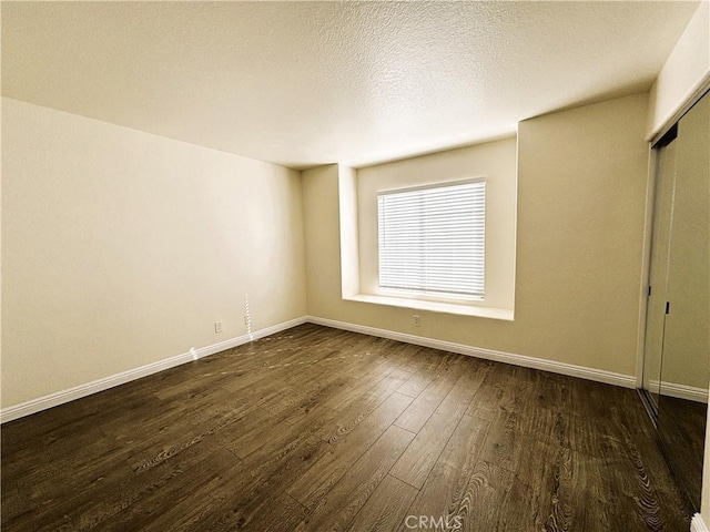 493 Hillsborough Way, Corona, CA 92879 - unfurnished room featuring dark wood finished floors and baseboards