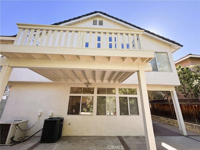 493 Hillsborough Way, Corona, CA 92879 - back of house with stucco siding and a patio area