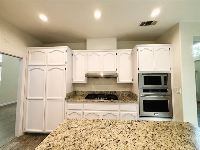 493 Hillsborough Way, Corona, CA 92879 - kitchen featuring stainless steel appliances, light stone counters, under cabinet range hood, white cabinets, and recessed lighting