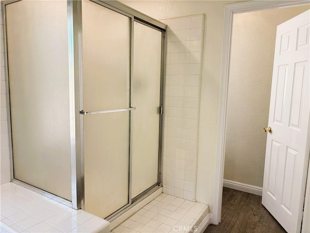 493 Hillsborough Way, Corona, CA 92879 - bathroom featuring a stall shower and wood finished floors