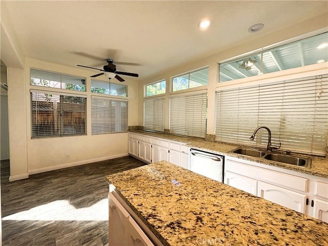 493 Hillsborough Way, Corona, CA 92879 - kitchen with stainless steel dishwasher, a ceiling fan, white cabinetry, dark wood-style flooring, and recessed lighting