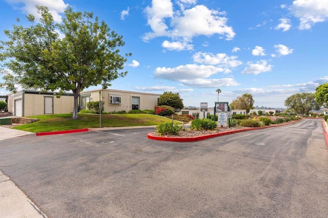 3621 Vista Campana S Unit 54, Oceanside, CA 92057 - view of asphalt road featuring curbs