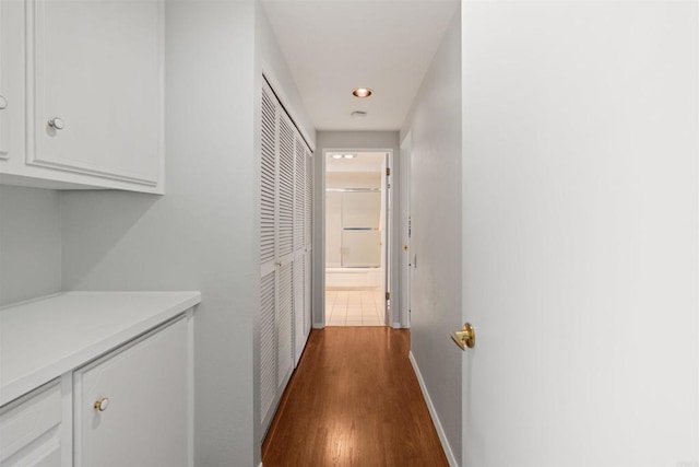 3621 Vista Campana S Unit 54, Oceanside, CA 92057 - corridor with recessed lighting and dark wood finished floors