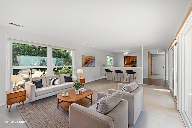 3621 Vista Campana S Unit 54, Oceanside, CA 92057 - living area featuring baseboards and ceiling fan