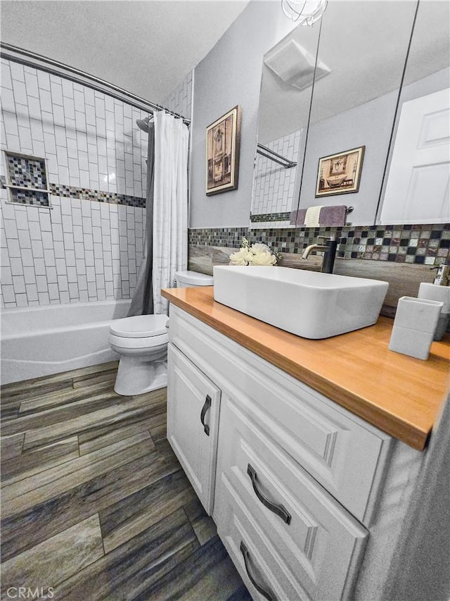 10659 Lakefront Dr, Norwalk, CA 90650 - bathroom with vanity, backsplash, and shower / bath combination with curtain