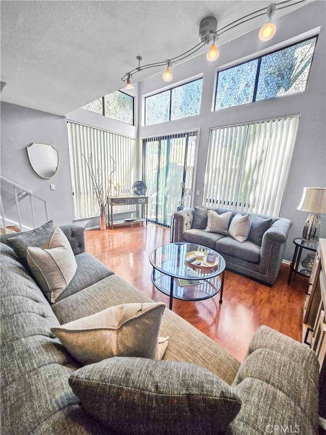 10659 Lakefront Dr, Norwalk, CA 90650 - living area with wood finished floors and a textured ceiling