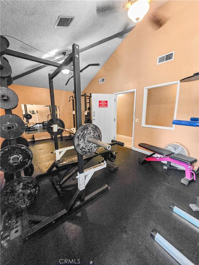 10659 Lakefront Dr, Norwalk, CA 90650 - exercise area featuring a textured ceiling and a garage