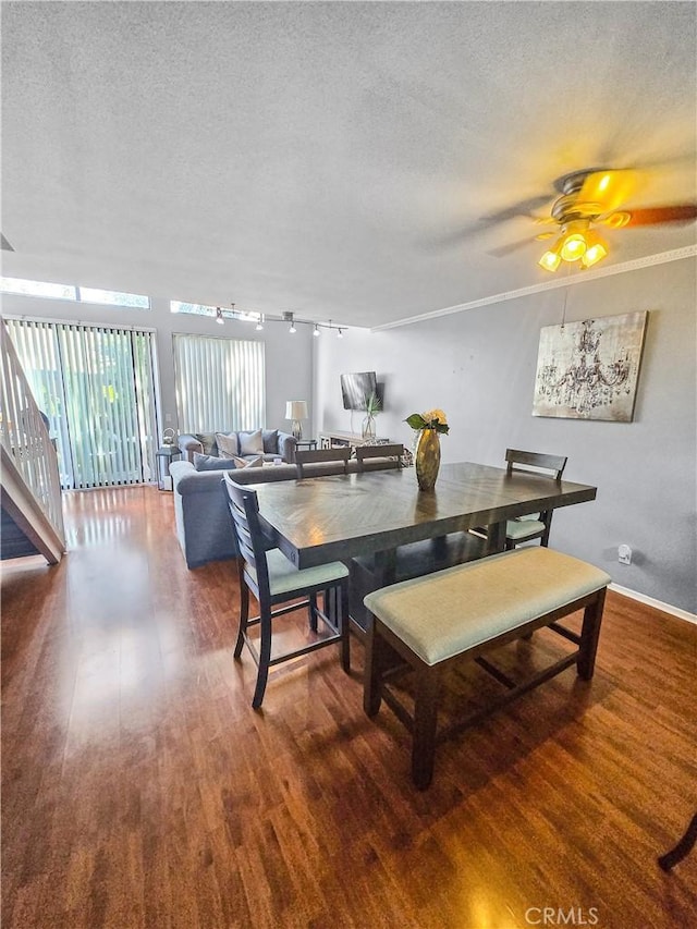 10659 Lakefront Dr, Norwalk, CA 90650 - dining space featuring wood finished floors, a textured ceiling, a ceiling fan, and track lighting
