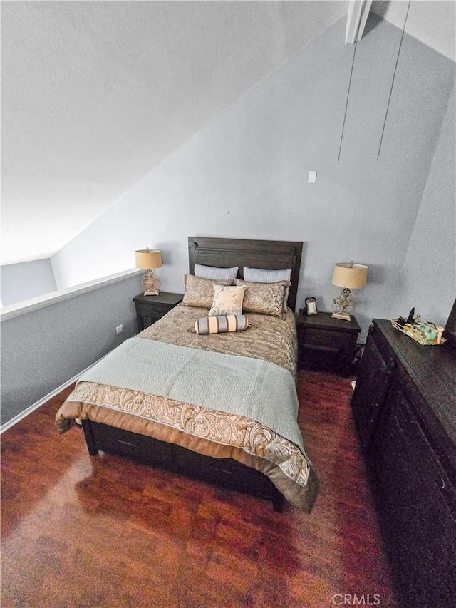 10659 Lakefront Dr, Norwalk, CA 90650 - bedroom featuring lofted ceiling and wood finished floors
