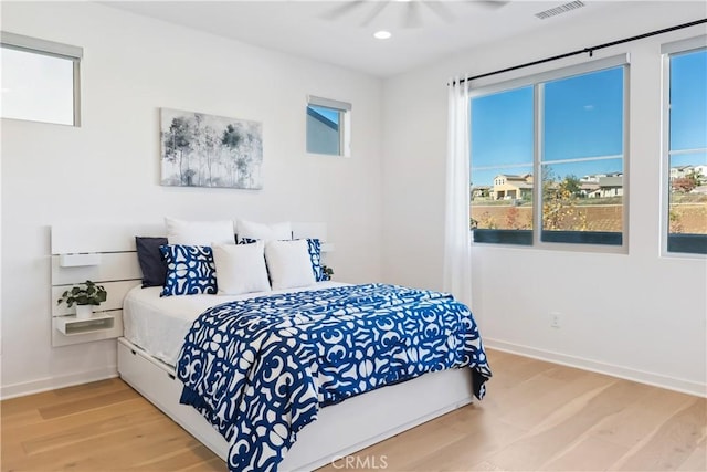 2371 Horseback Rd, Rancho Mission Viejo, CA 92694 - bedroom featuring multiple windows, light wood finished floors, recessed lighting, and ceiling fan