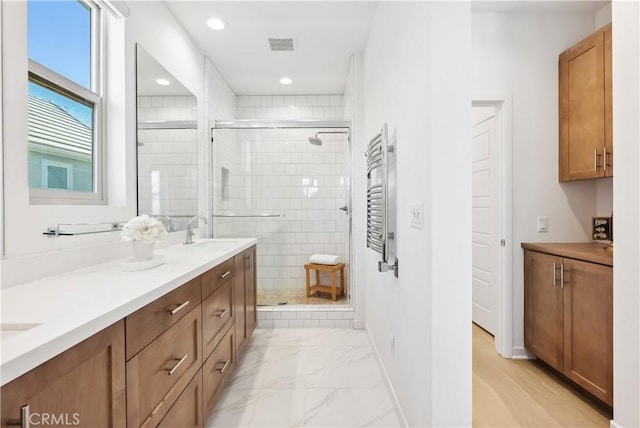 2371 Horseback Rd, Rancho Mission Viejo, CA 92694 - bathroom with a stall shower, double vanity, recessed lighting, and marble finish floors
