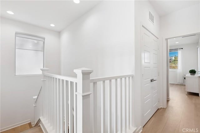 2371 Horseback Rd, Rancho Mission Viejo, CA 92694 - hall with an upstairs landing, recessed lighting, and light wood-type flooring