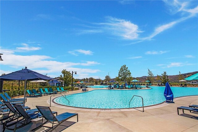 2371 Horseback Rd, Rancho Mission Viejo, CA 92694 - community pool featuring a patio area