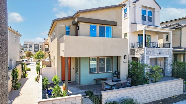 2371 Horseback Rd, Rancho Mission Viejo, CA 92694 - view of front of property with stucco siding and a gate