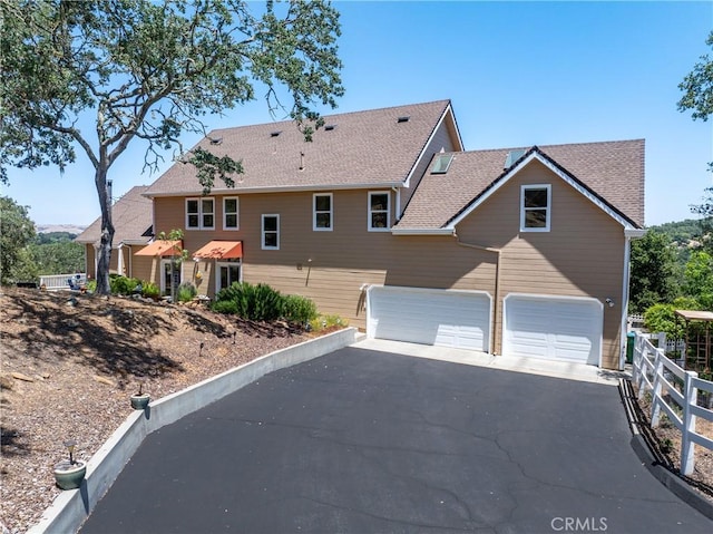 6600 San Gabriel Rd, Atascadero, CA 93422 - view of front of house featuring driveway, roof with shingles, and a garage