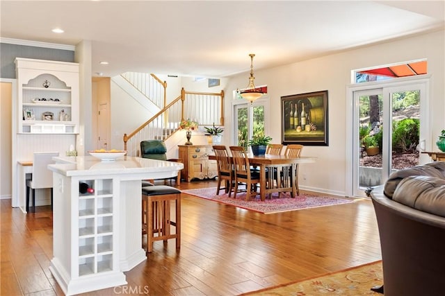 6600 San Gabriel Rd, Atascadero, CA 93422 - dining room featuring stairway, plenty of natural light, hardwood / wood-style floors, ornamental molding, and recessed lighting