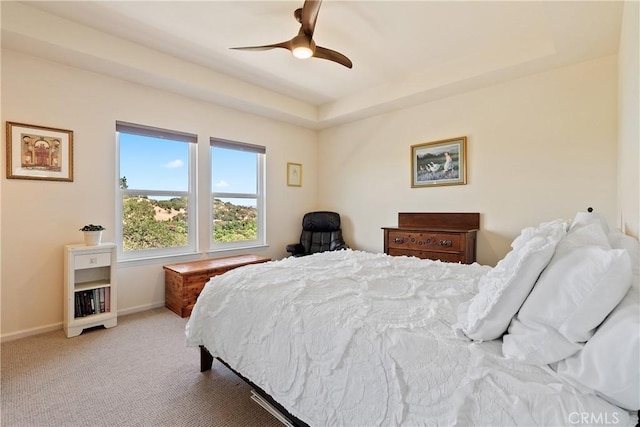 6600 San Gabriel Rd, Atascadero, CA 93422 - bedroom with light carpet, ceiling fan, and a raised ceiling