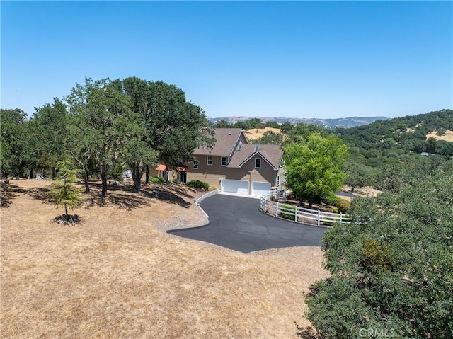 6600 San Gabriel Rd, Atascadero, CA 93422 - obstructed view of property with asphalt driveway