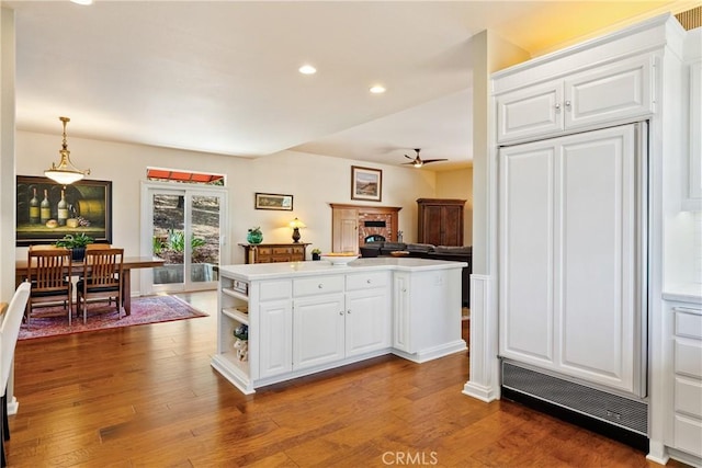 6600 San Gabriel Rd, Atascadero, CA 93422 - kitchen with a kitchen island, recessed lighting, white cabinetry, light countertops, and a ceiling fan