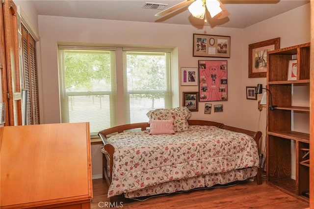 2787 Grape Way, Chico, CA 95973 - bedroom with wood finished floors, a closet, and a ceiling fan